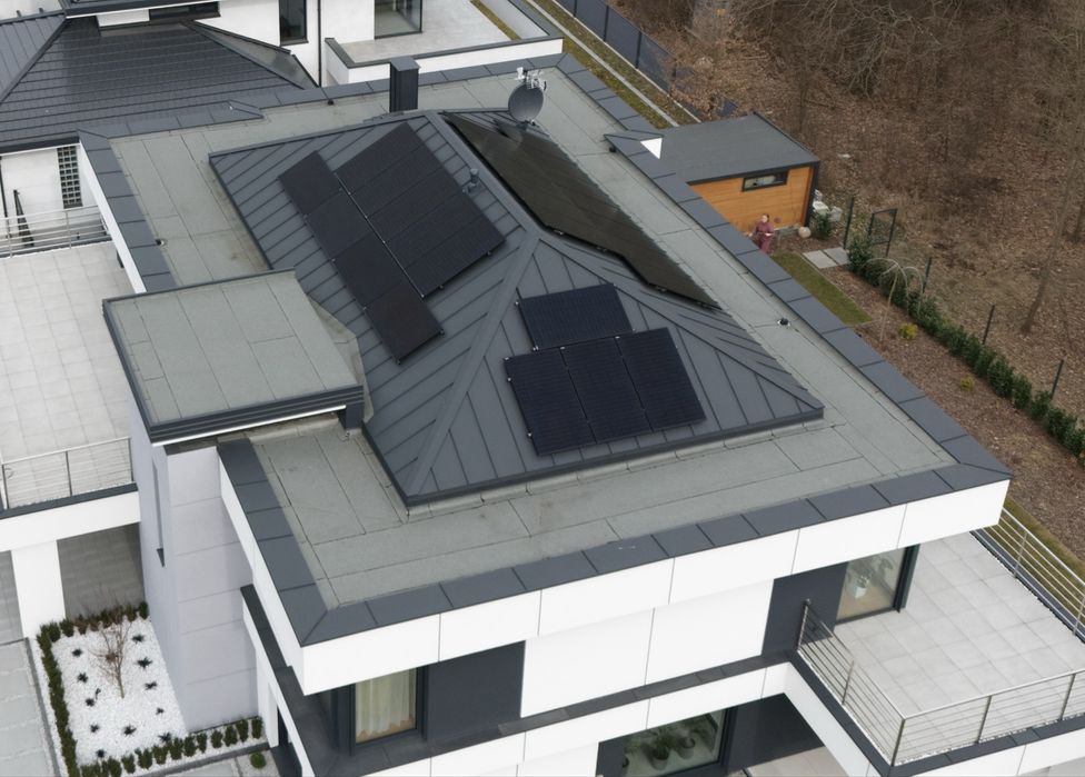 Dachy płaskie Tarasy Balkony Hydroizolacja Izolacja dachów Dekarz