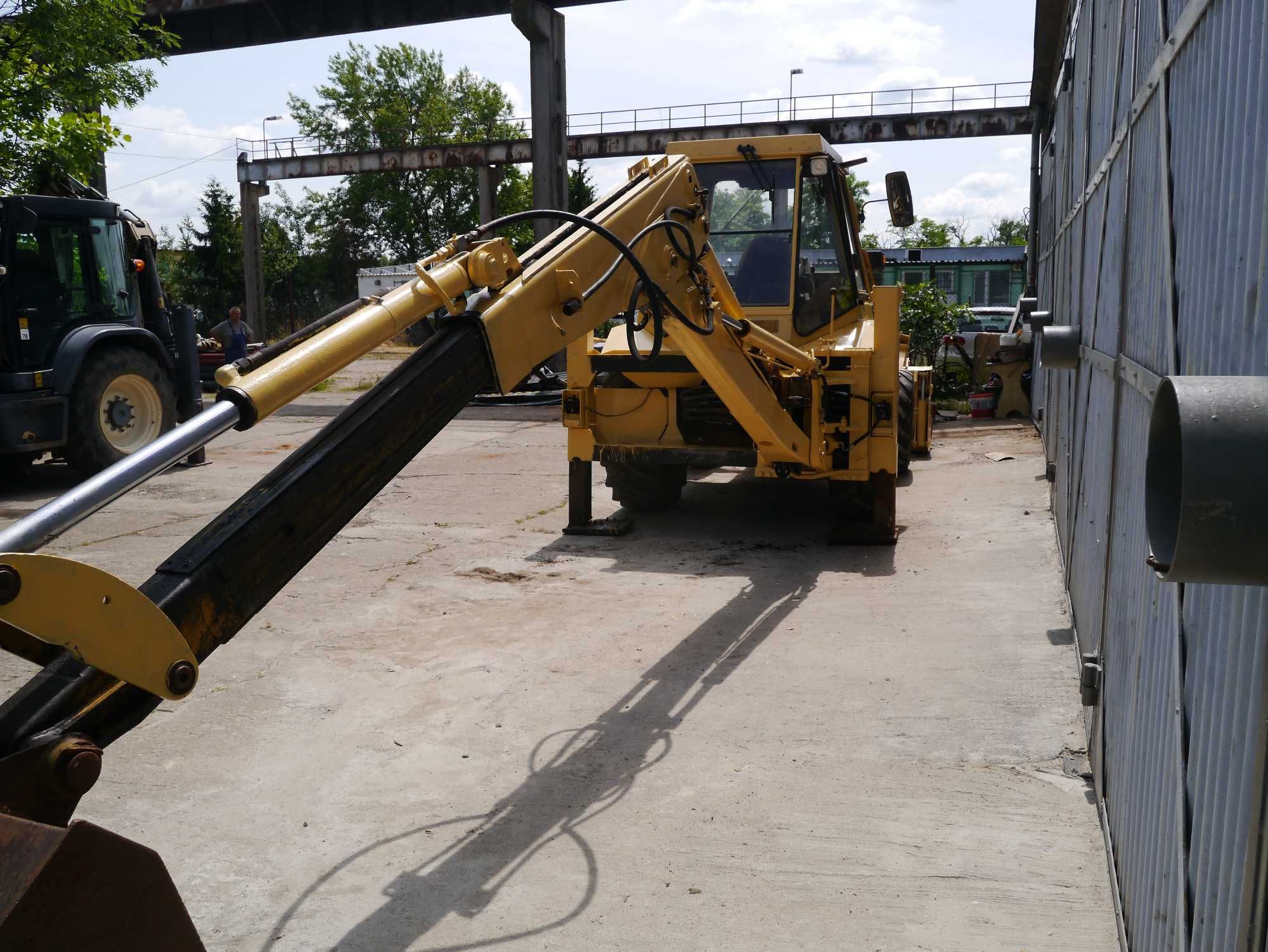 Koparko-ładowarka Caterpillar 428, 1990r