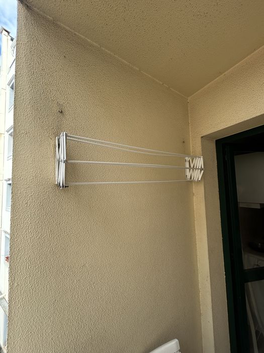 Estendal de parede dobrável