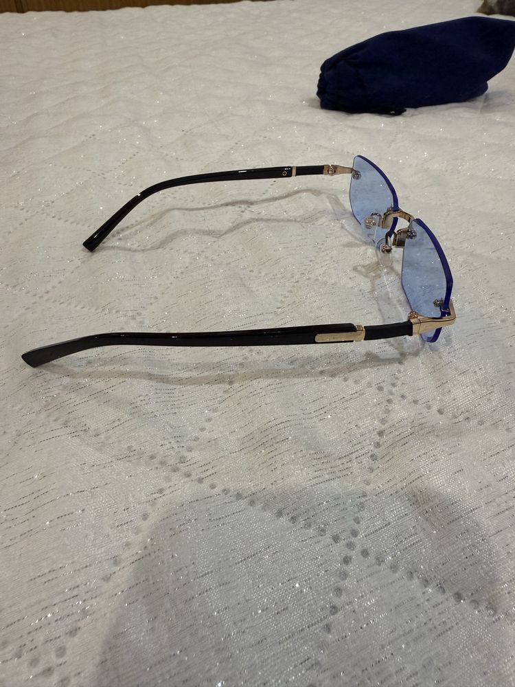Oculos de sol.