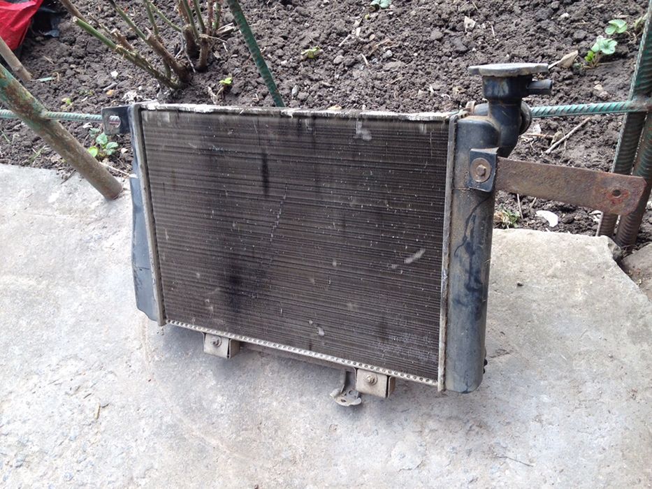 Продам радіатор + вентелятор охолодження Nissan cherry