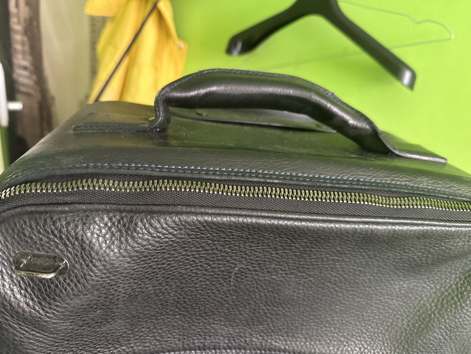 Używana, skórzana walizka, wymaga naprawy składanego uchwytu