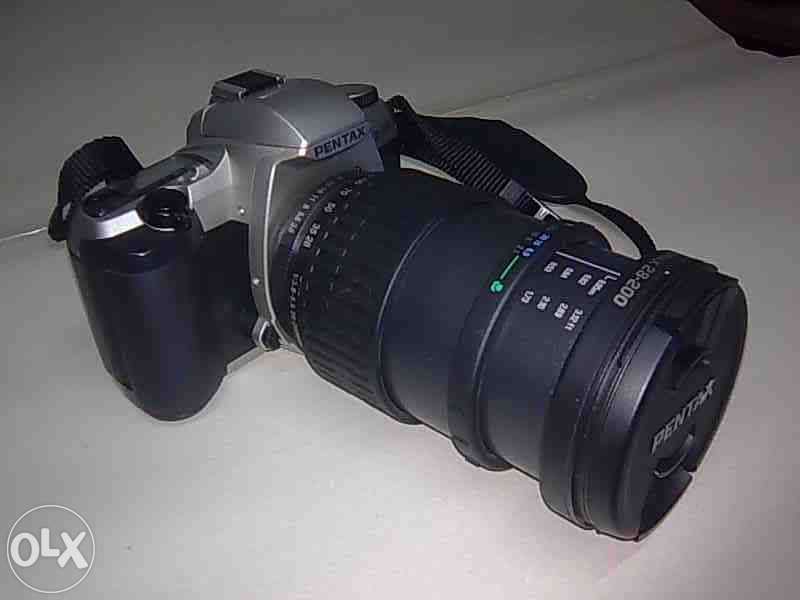 Máquina fotográfica Pentax + objectiva
