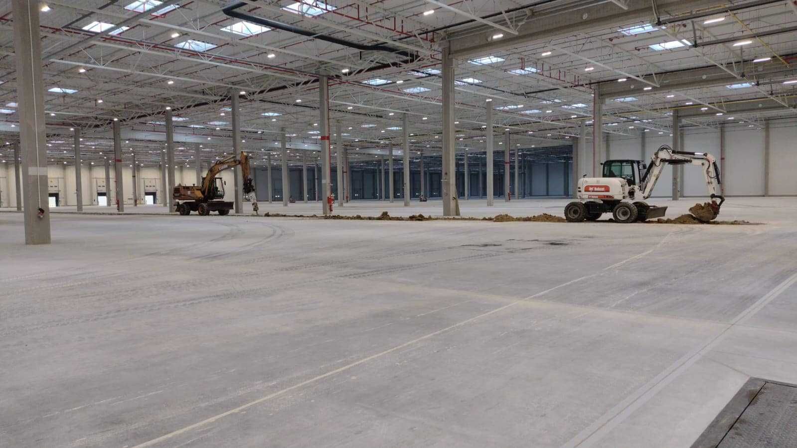 Budowa sieci sanitarnych i deszczowych, roboty ziemne, wyburzenia