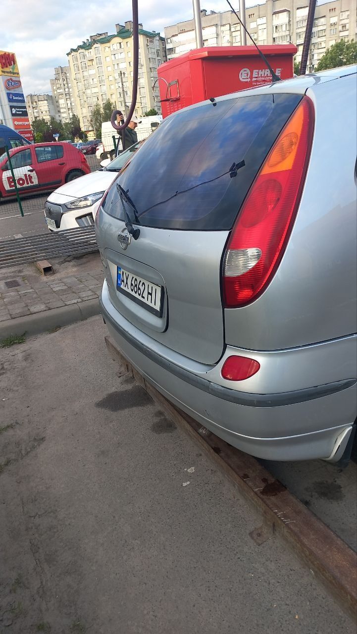 Ніссан альмера тіно