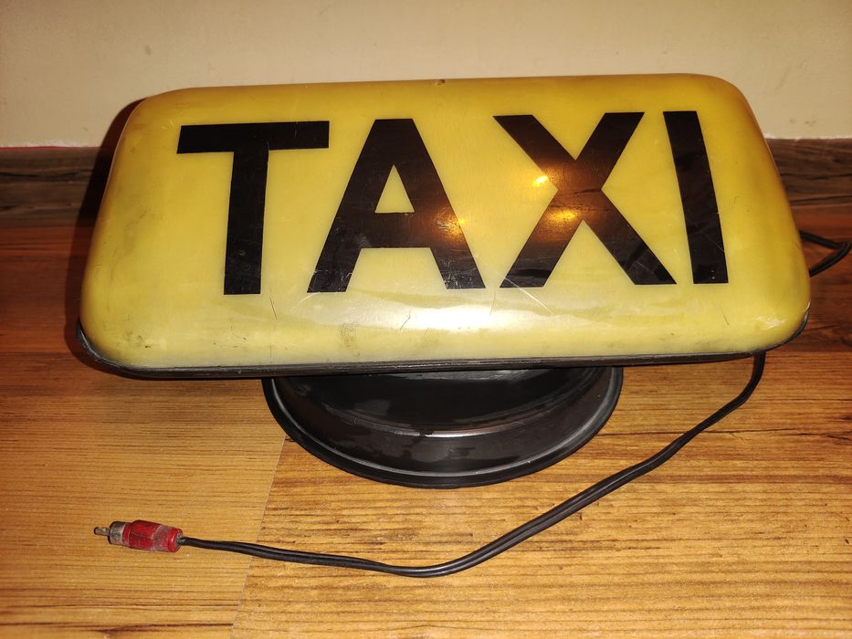 Kogut szyld TAXI