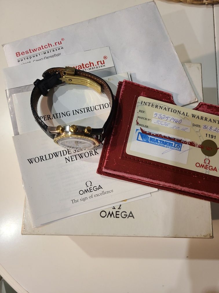 Часы Omega золотые