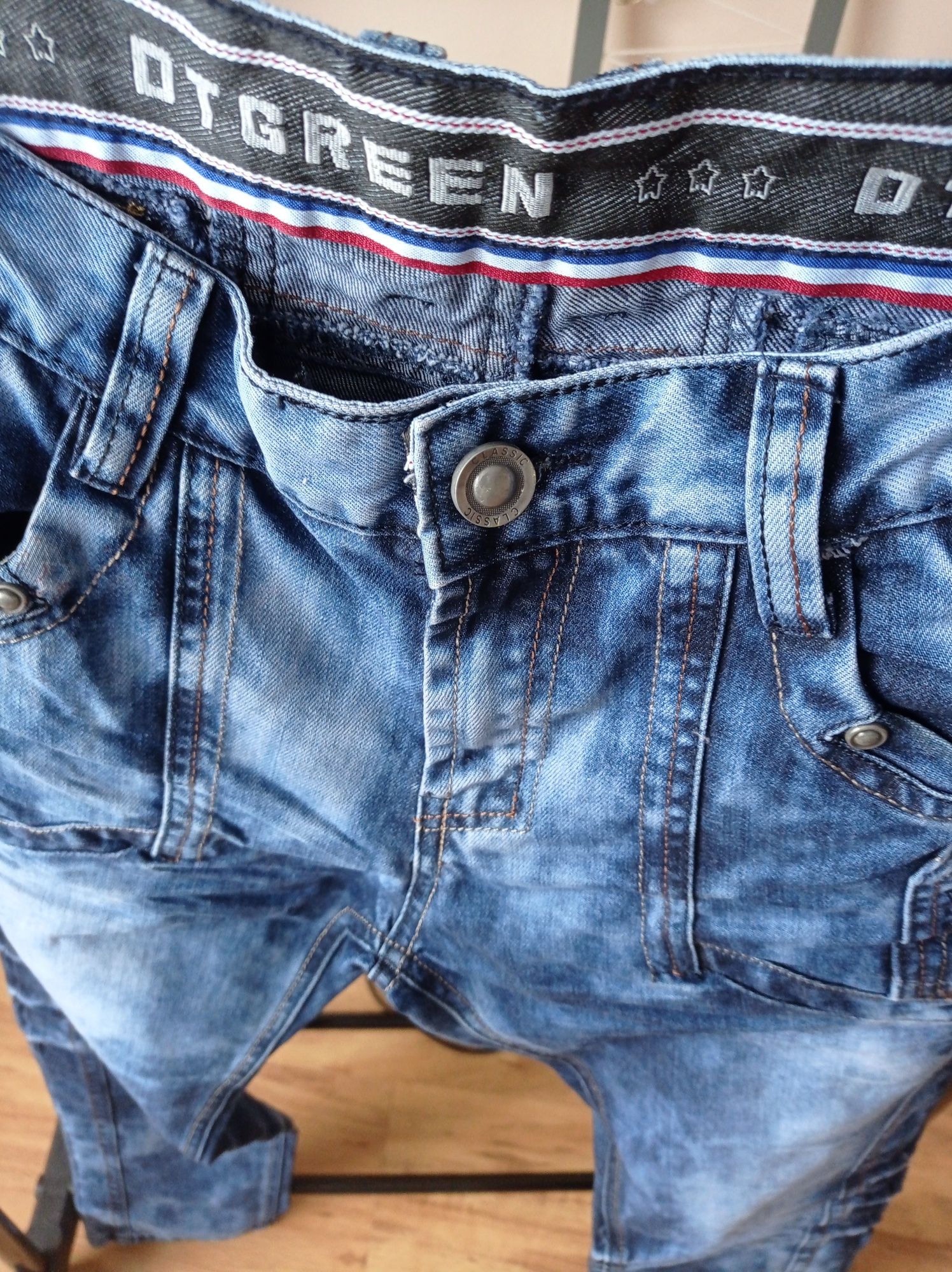 Spodnie jeans męskie z przetarciami M