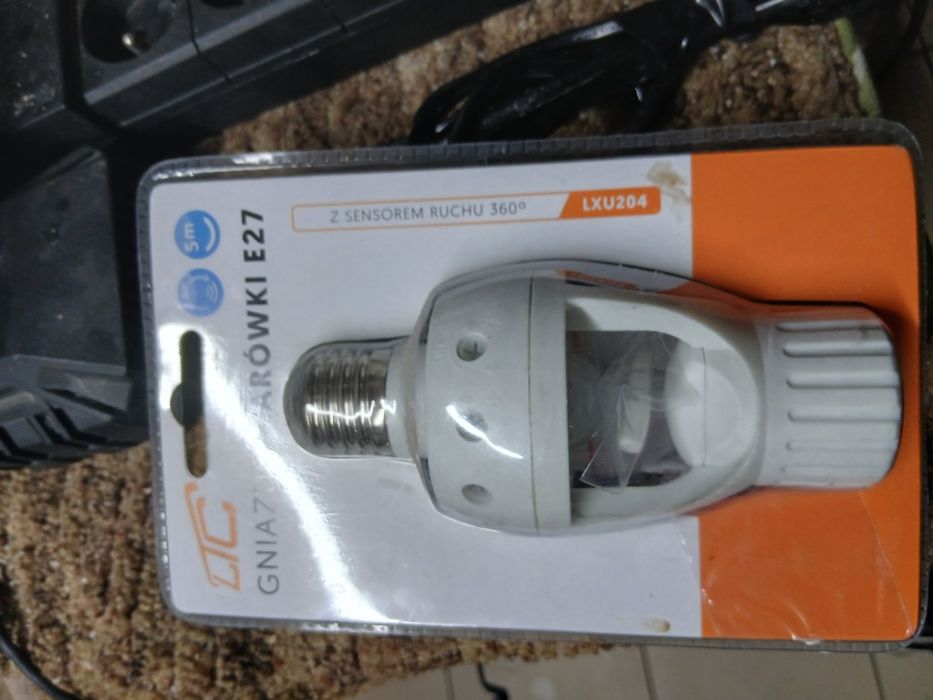 Oprawka z czujka ruchu