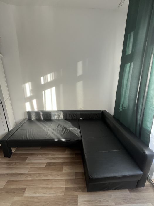 Czarny narożnik z funkcją spania