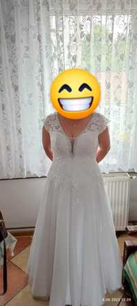 Suknia ślubna pięknie się mieniąca roz XL