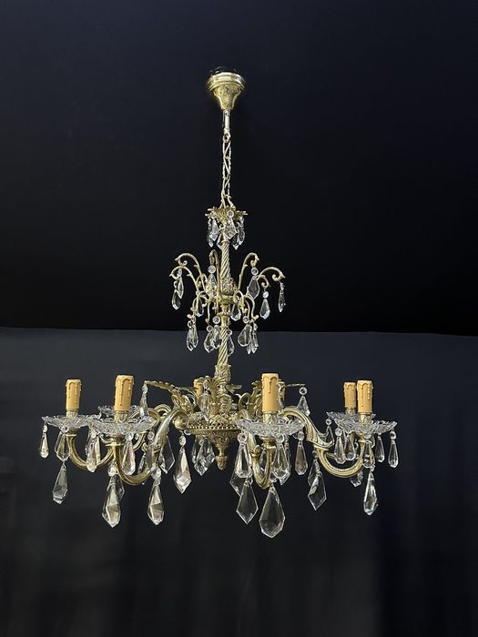 Люстри, бронзові