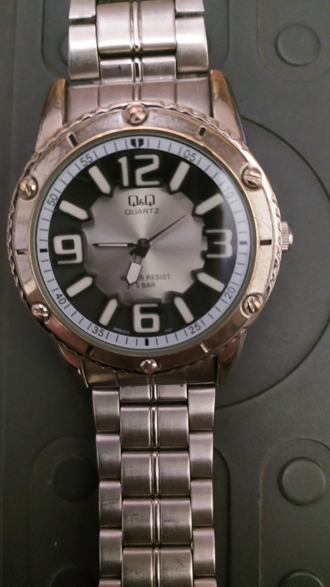 Годинник "Casio" та Q&Q
