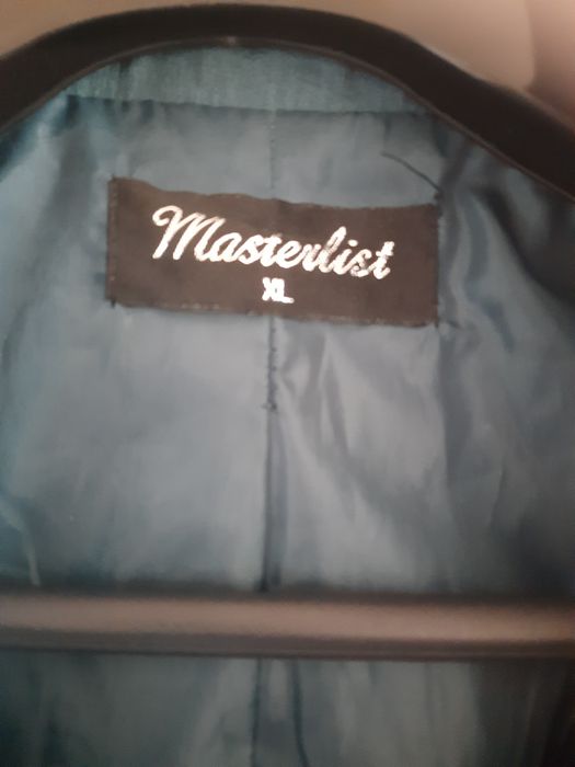 Parka impermeável azul petróleo