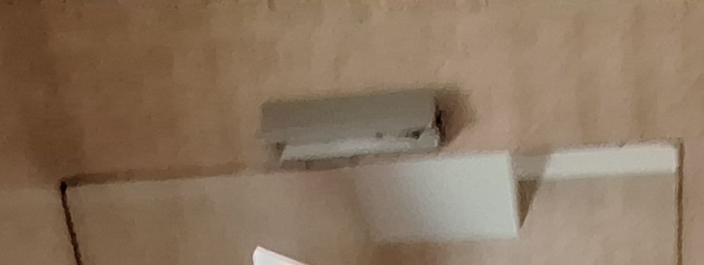 Aplique de luz em metal