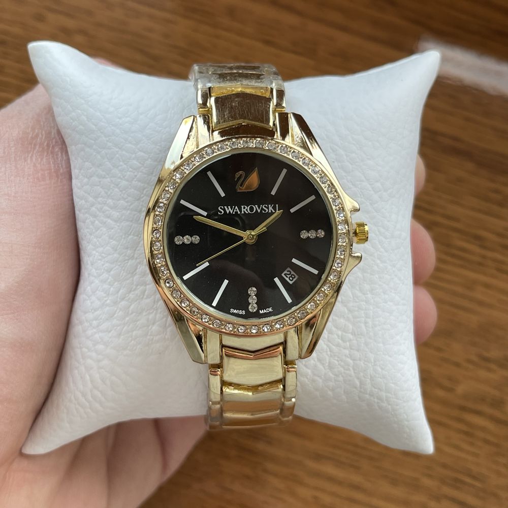 Жіночий годинник Swarovski золотого кольору