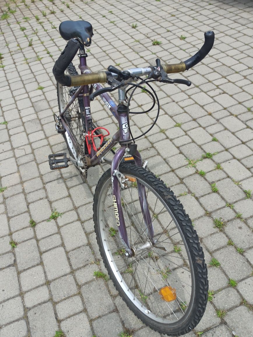 Rower górski MTB, terenowy, fioletowy.