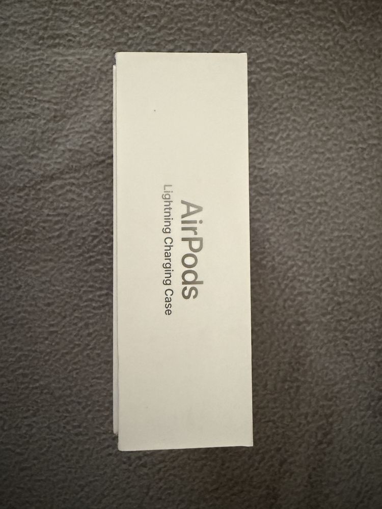 AirPods Apple 3rd  Original Generation with top-up Lightning Case.