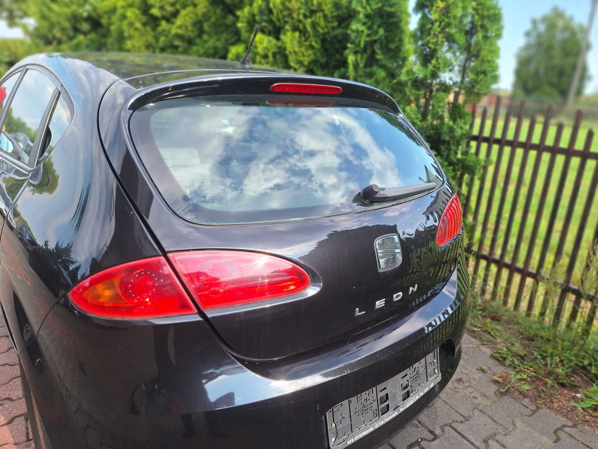Seat Leon II lampy tylne w błotnik i klapę OE