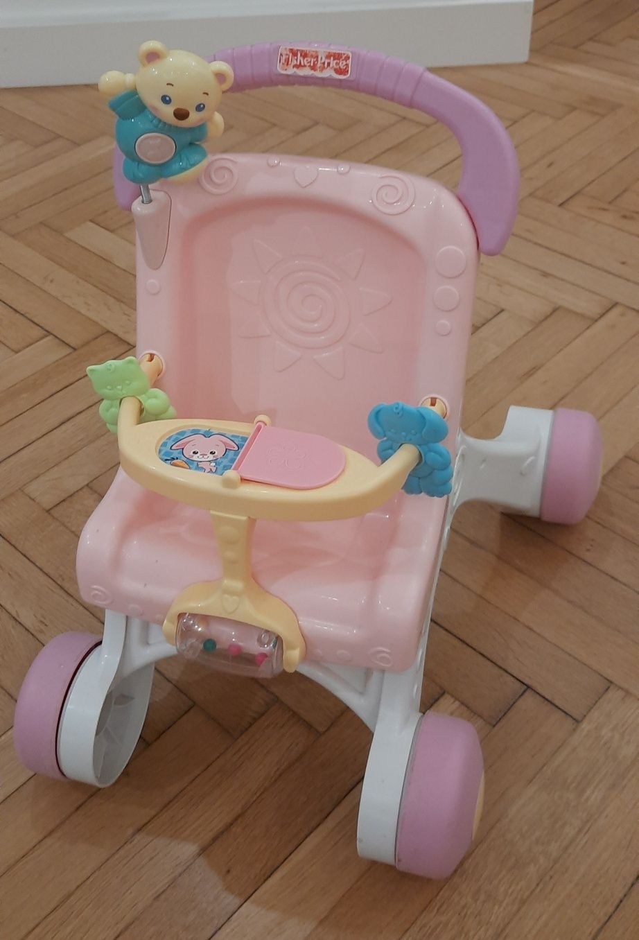 Różowy wózek,  pchacz, chodzik Fisher price