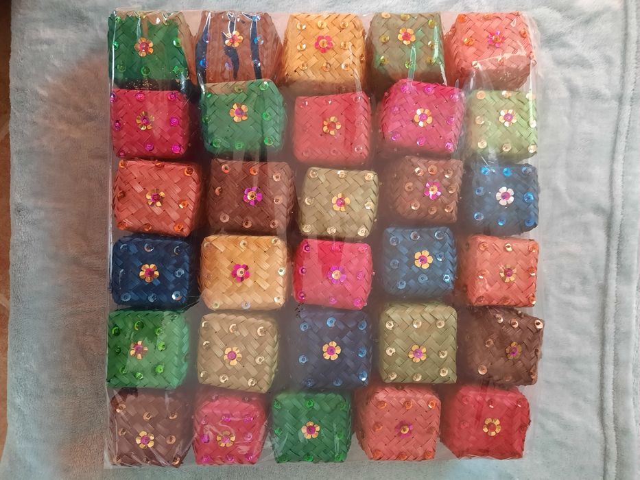 Caixinhas e carteiras em palha