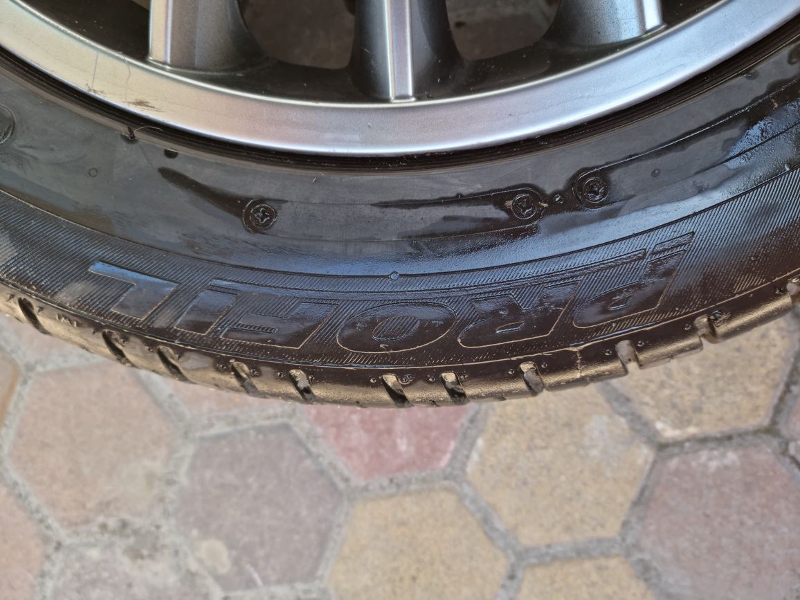 диски 4шт.  з резиною 215/55 R 17. Германія.