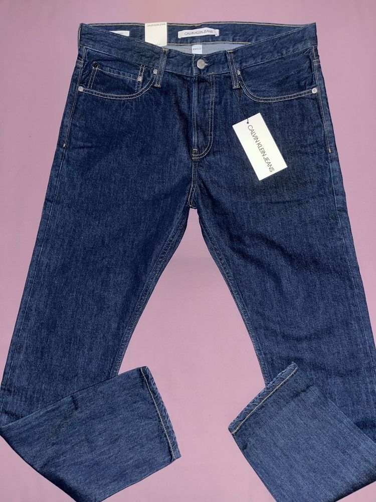 Wyprzedaż spodnie męskie Calvin Klein Jeans.