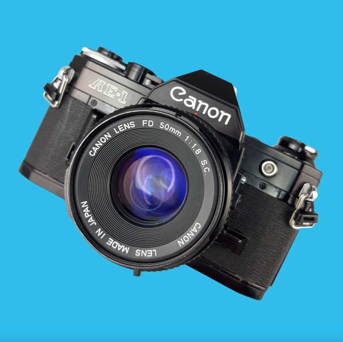 Canon AE-1 Preta + Canon FD 50mm f/1.8 Prime - (testada e limpa)