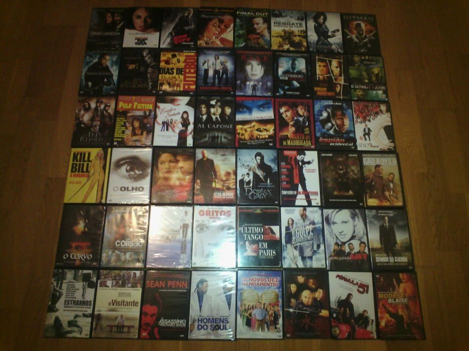 Coleção de 50 DVD novos na caixa Filmes recentes a 0.50 cêntimos cada