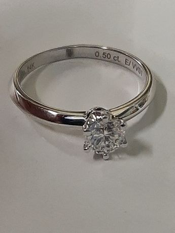 Золотое кольцо с 0.50ct бриллиантом.