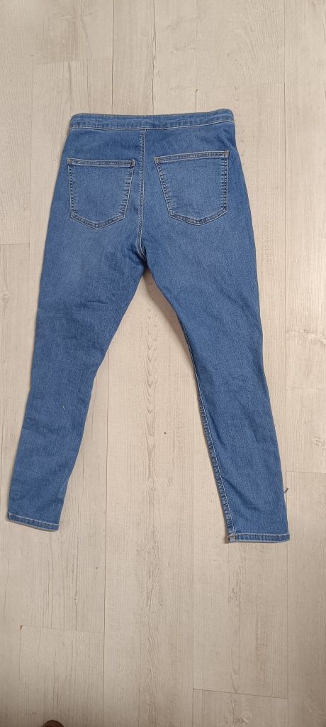 Spodnie dżinsowe typu rurki z podarciami rozmiar W34 L30