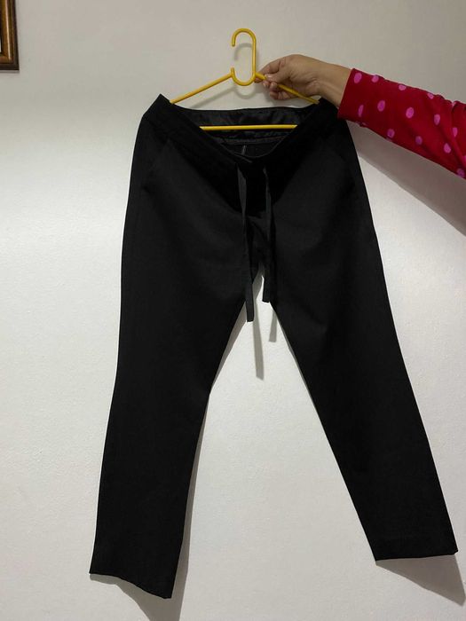 Calças pretas clássicas