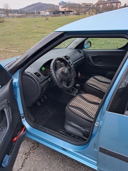 Skoda   Roomster