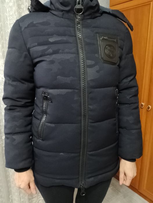 Продам зимову куртку на підлітка 12-13 років.