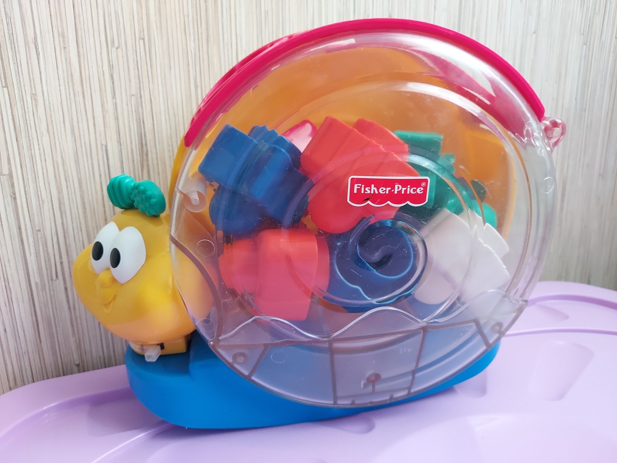 Sorter ślimaczek Fisher Price, grające radyjko i  wieża- piramidka