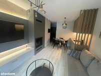 Apartament z ogródkiem i kominkiem, wysoki standard
