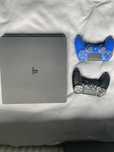 Playstation 4 slim 1tb + 2 pady + Gry