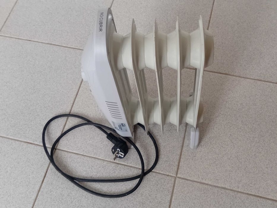 Mini radiador a óleo