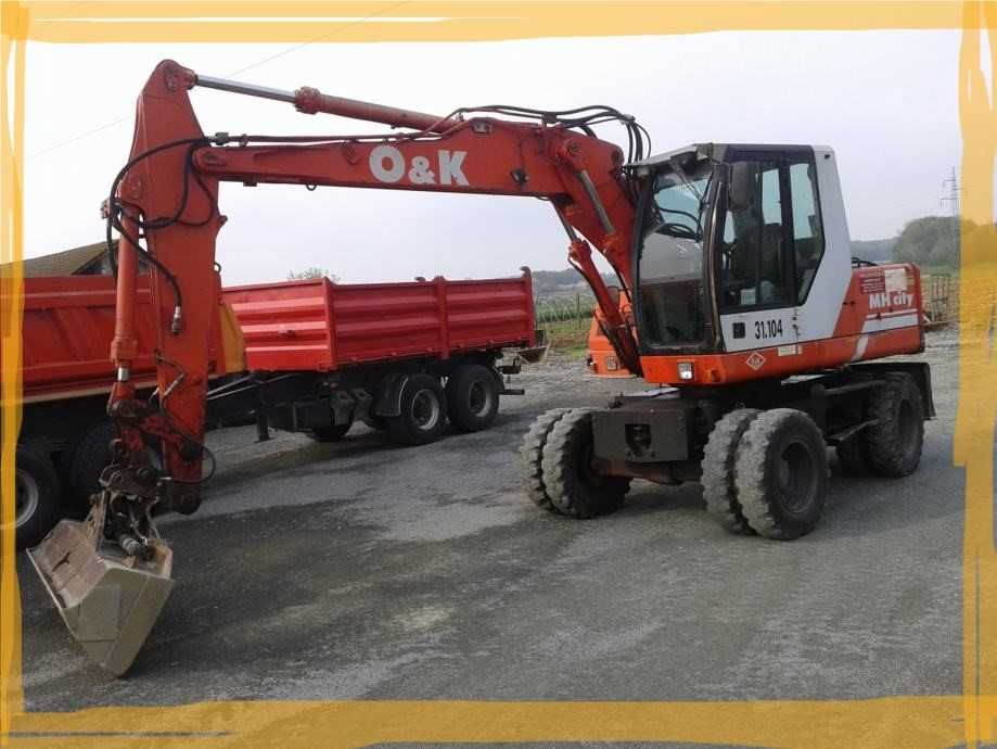 Колісний екскаватор O&K MH4 1996 року