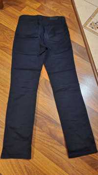 Męskie chłopięce spodnie jeansy slim fit czarne H&M 30 EUR 170/76A
