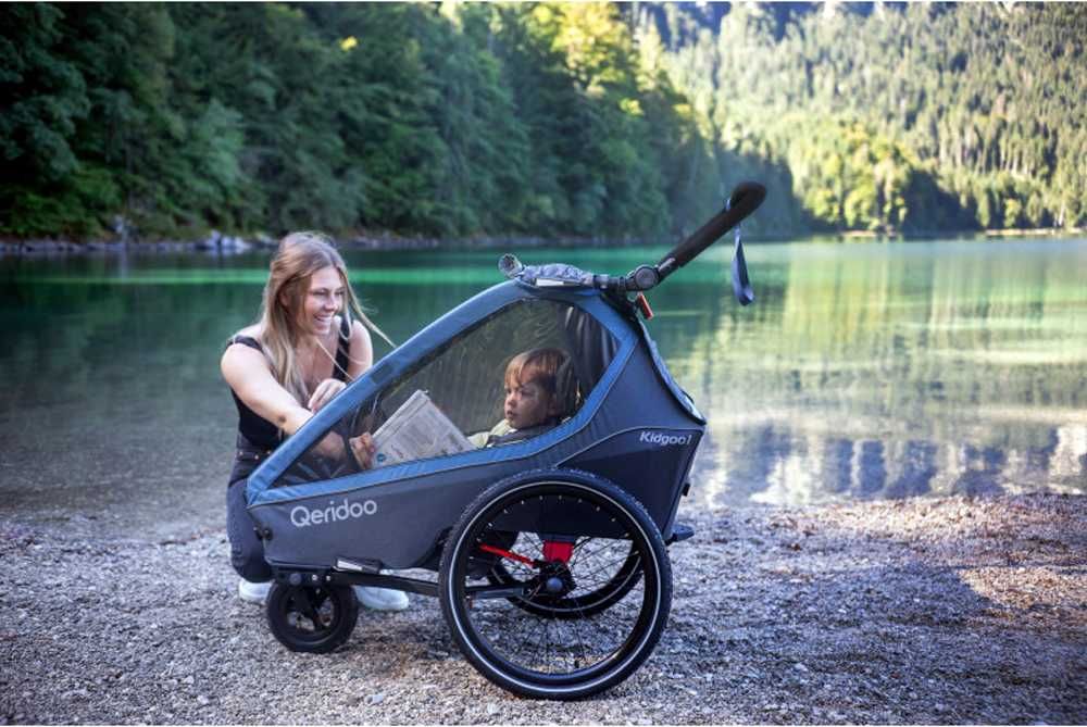 Qeridoo KidGoo 2 Ivy Green przyczepka rowerowa dla dwójki dzieci