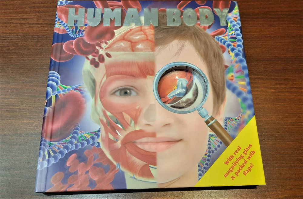 Human Body książka edukacyjna z lupą o tajemnicach ludzkiego ciała