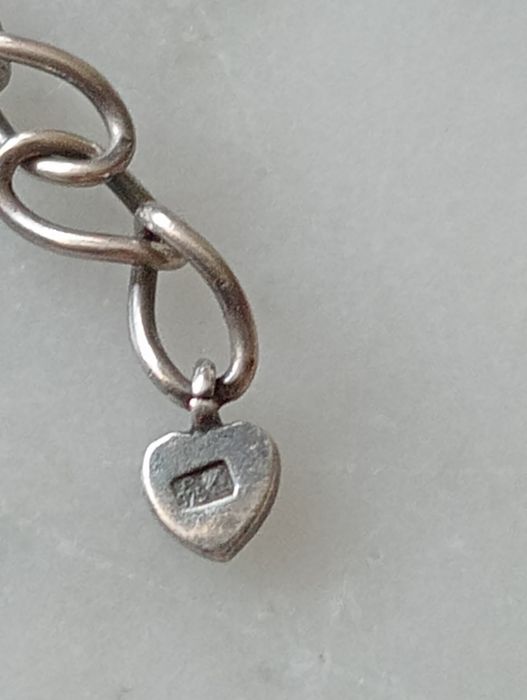 Stary zestaw srebrnej biżuterii z granatami