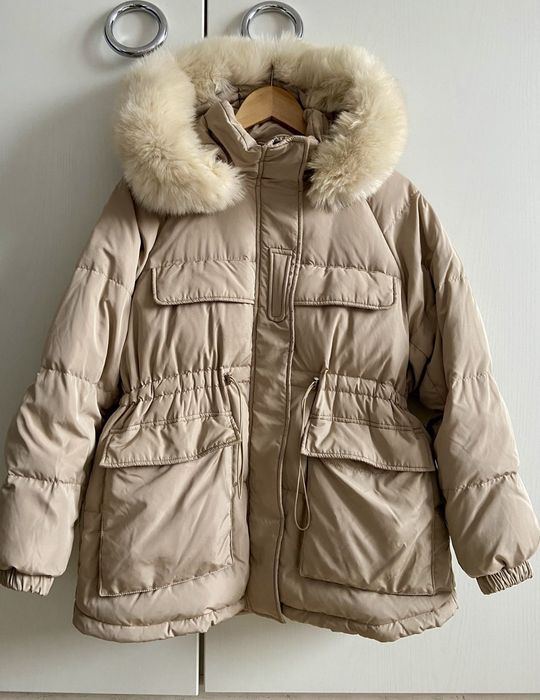 Пуховик бежевий натуральний пух