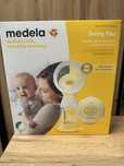 Молоковідсмоктувач Medela Swing Flex + пляшечка для годування Medela