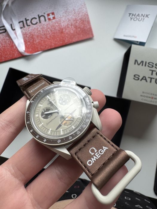 годинник Omega & Swatch