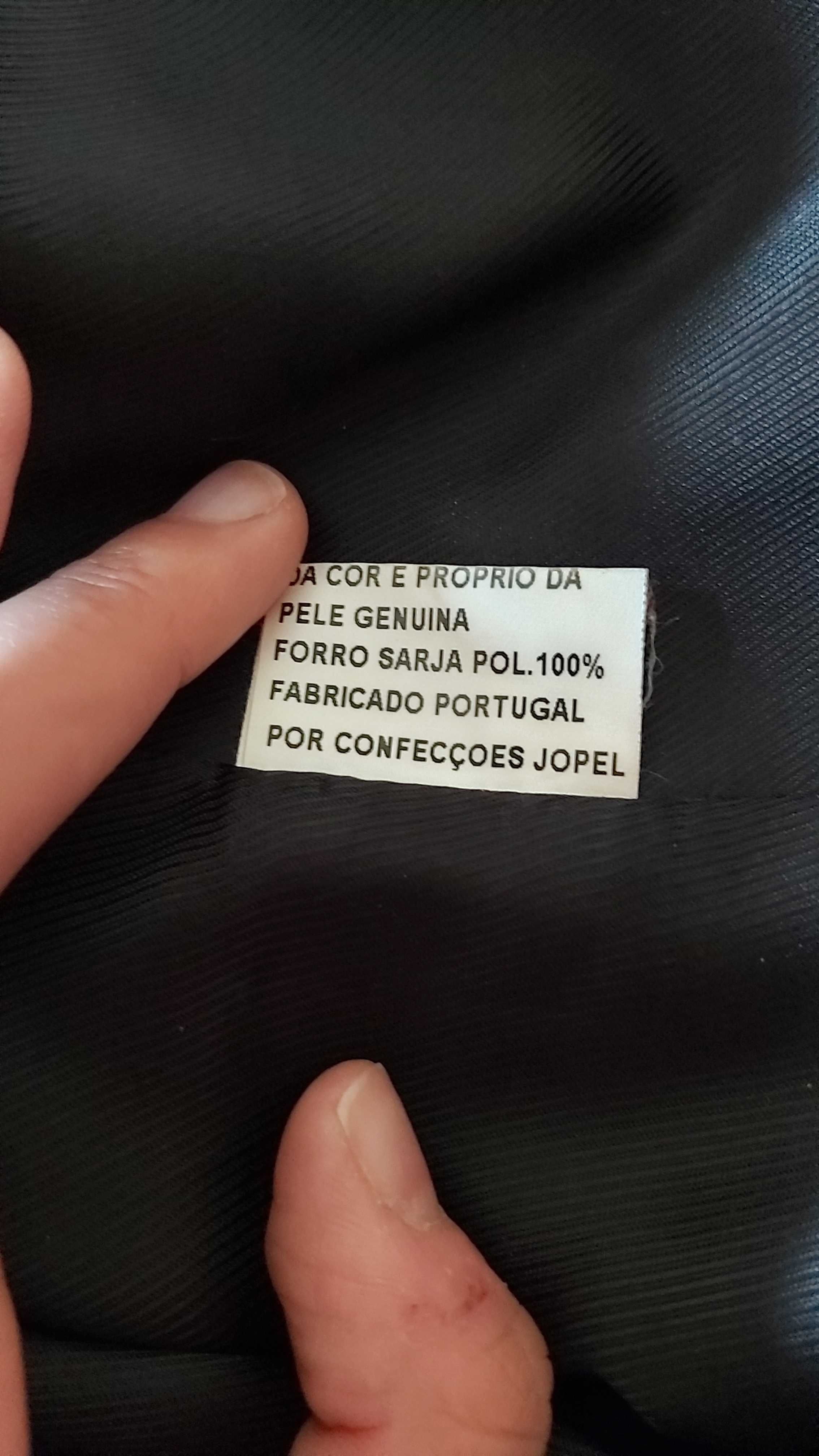 Casaco de pele genuína