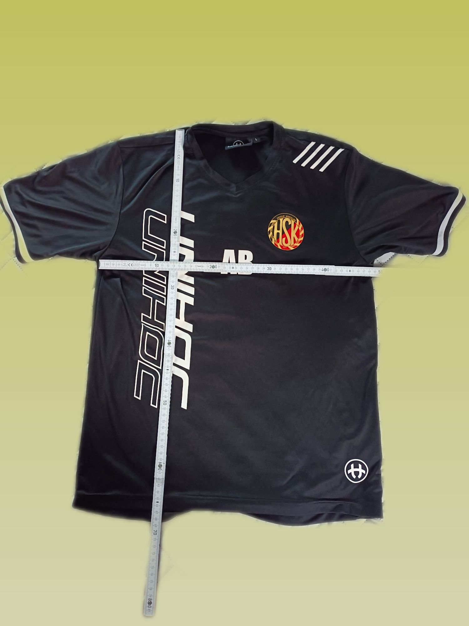 Czarna koszulka Unihock klubu Hasselby Sportklubb