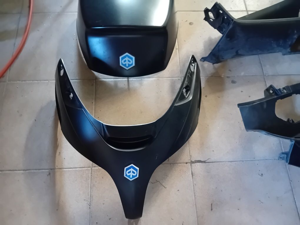 Farol e carnagens x8 xevo