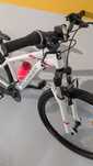 Bicicleta ROCKRIDER ST 100 (mulher) + Acessórios. Cor: Branca